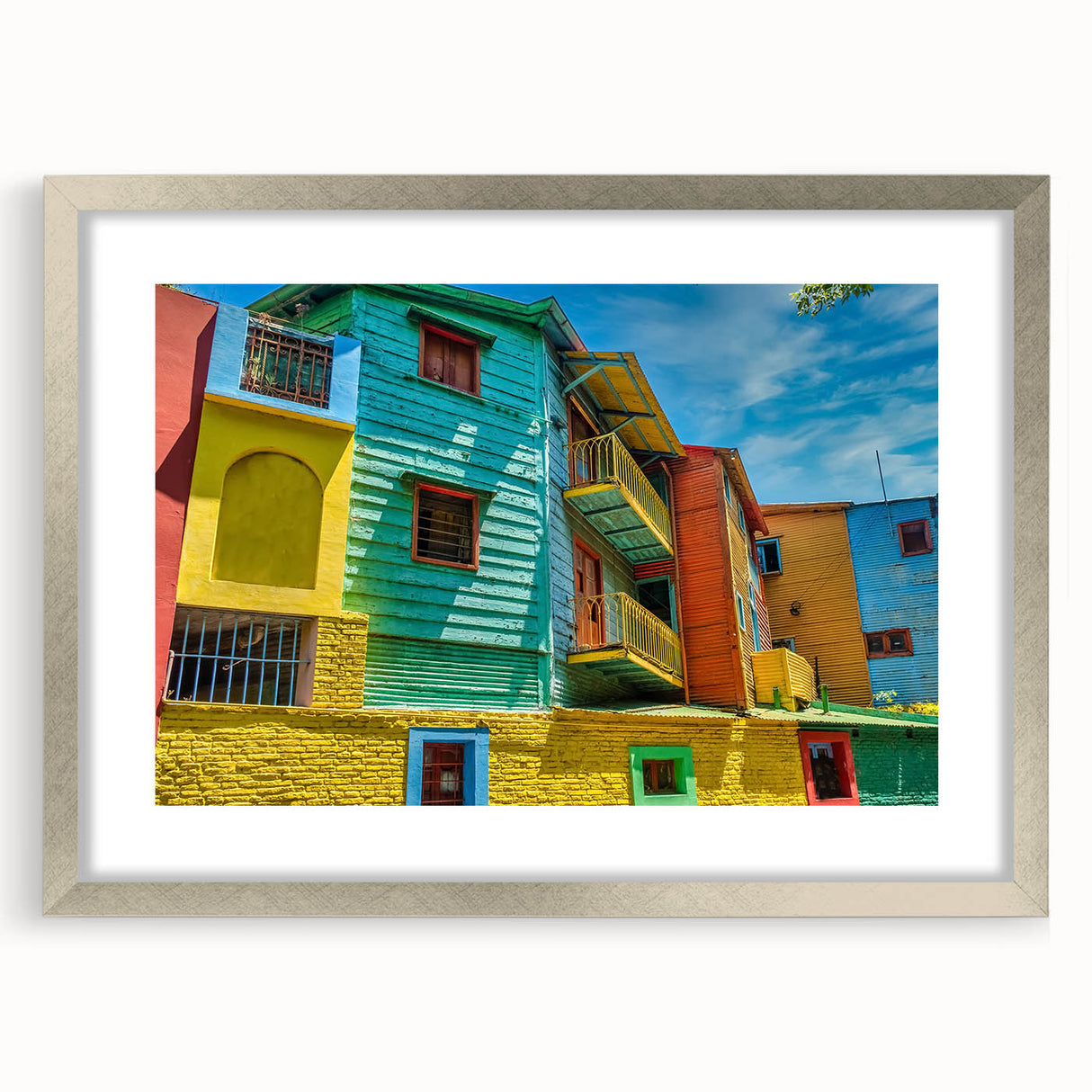 Textured abstract art print depicting a stylized Buenos Aires cityscape in muted earth tones on a framed silver mat.