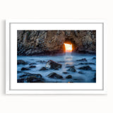 Abstract art print of Big Sur, California in muted earth tones on a framed white mat, suitable for dining room decor.