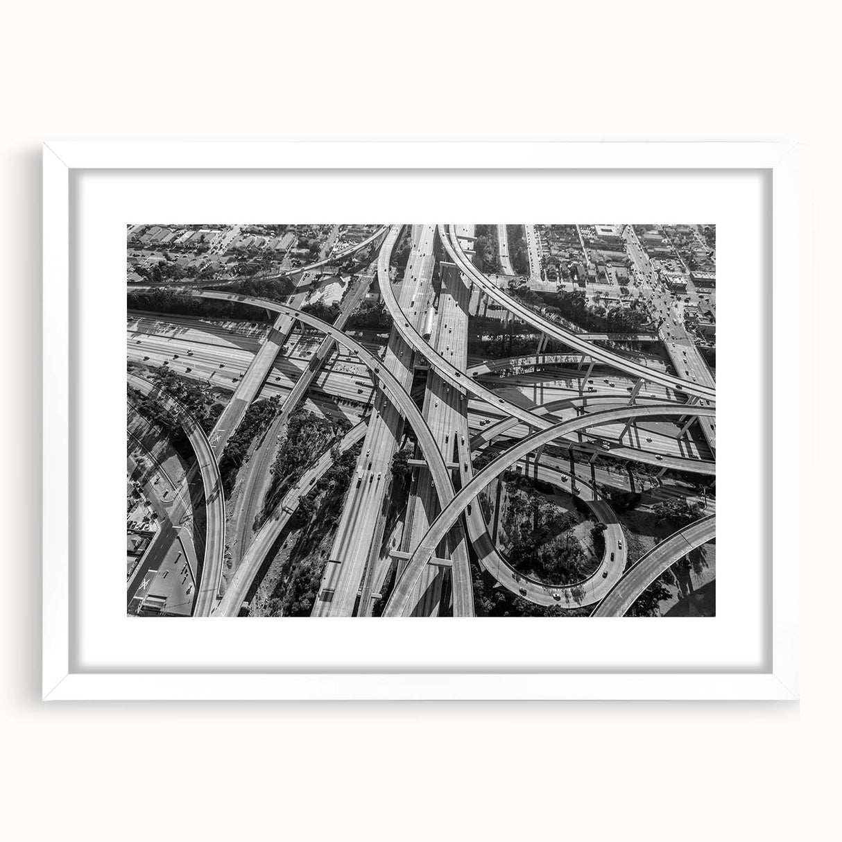 Abstract art print of Los Angeles skyline in muted gray and blue tones on a white framed poster.