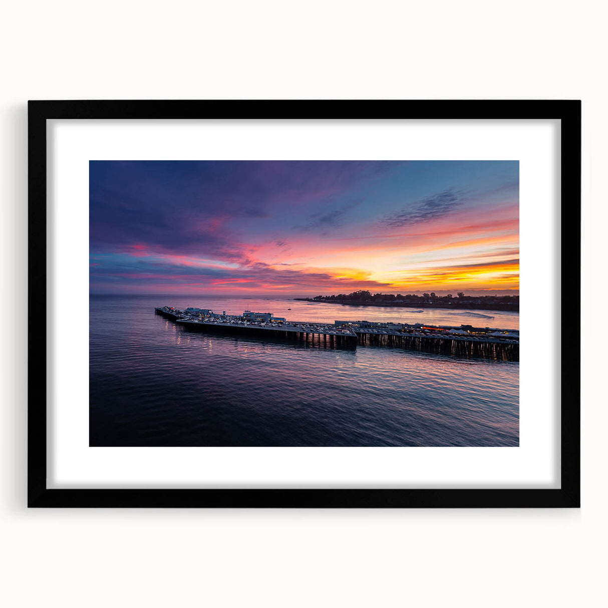 Colorful abstract art print of Santa Cruz scenery in a black frame, ideal for extra large living room wall art.