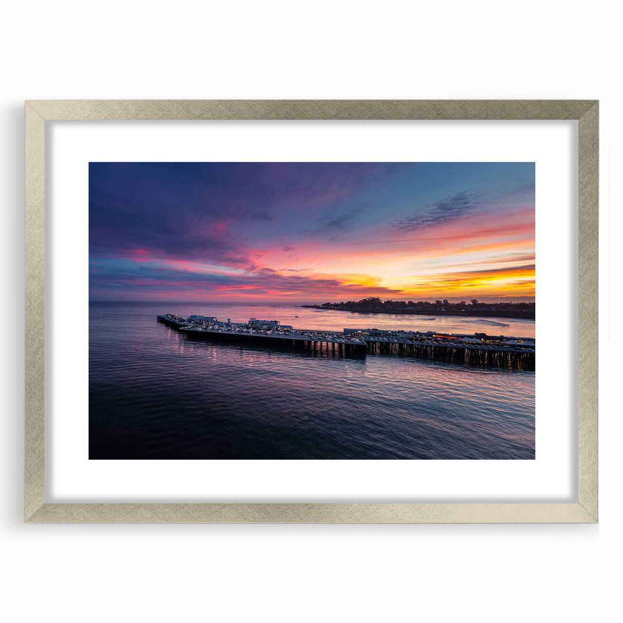 Textured abstract art print of Santa Cruz in muted earth tones on a framed silver mat, ideal for bedroom art.