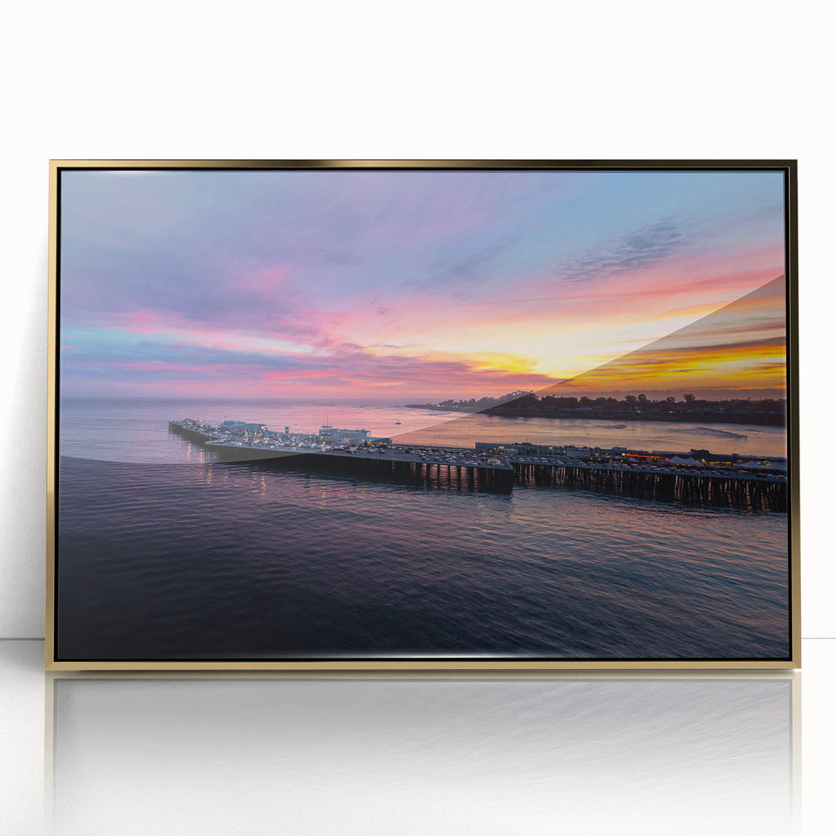 Large art print of Santa Cruz scenery in mid-century modernist style, framed in acrylic with gold tones.