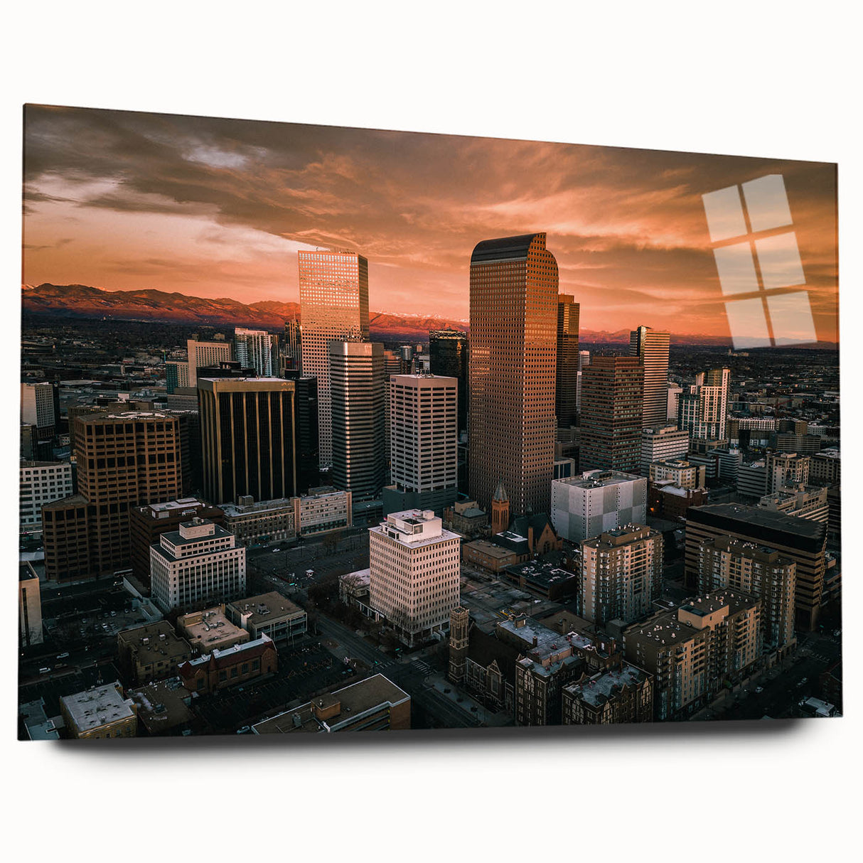 Large abstract wall art of Denver skyline in muted blues and greens on acrylic glass, ideal for bedroom or dining room decor.