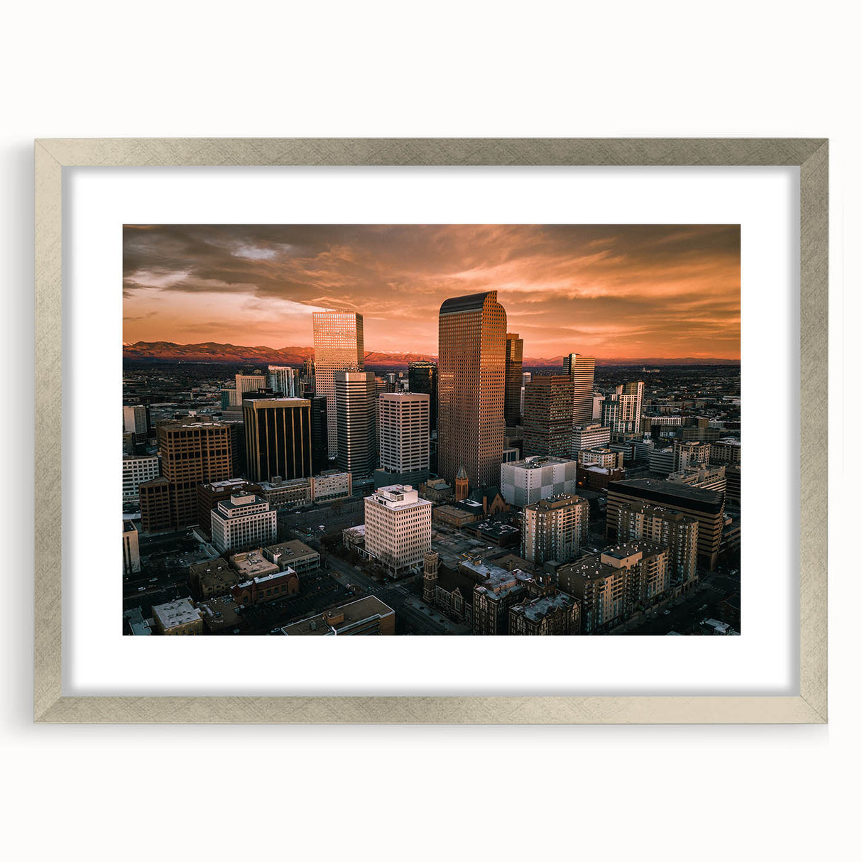 Textured abstract art print of Denver skyline in muted gray and silver tones, framed with a mat.
