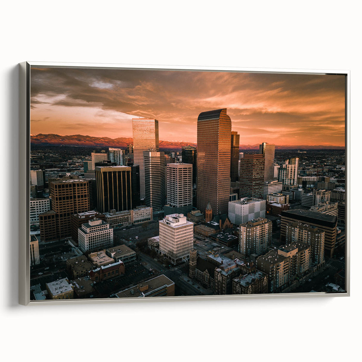 Framed canvas of a vintage-style Denver landscape with colorful art elements, ideal for modern living room decor.