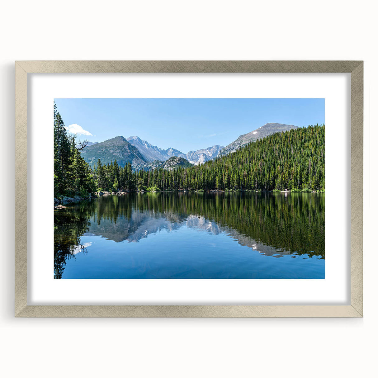Textured abstract art print of Colorado Springs in muted earth tones on a framed silver mat, suitable for bedroom art.
