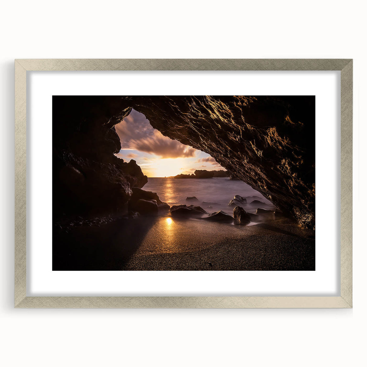 Textured art print of abstract Maui scenery in muted earth tones, framed in silver, ideal for bedroom art.