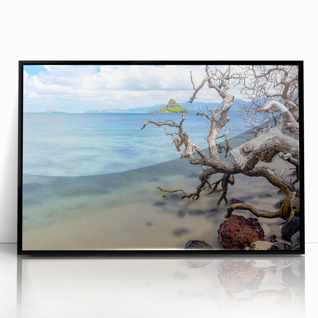 Large abstract wall art depicting Oahu's coastal scenery in muted blue and green hues on a framed acrylic panel.