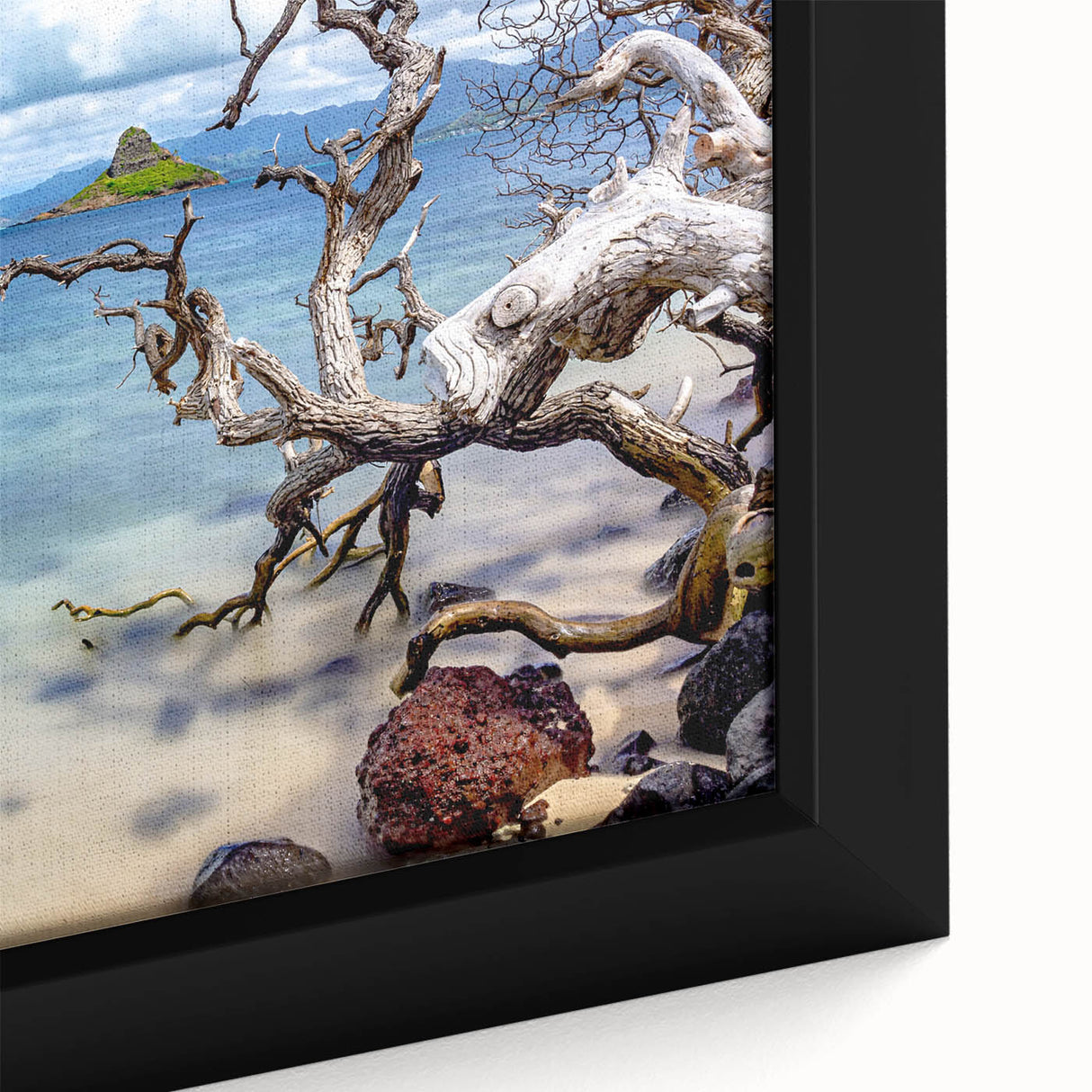 Close-up of a black framed canvas depicting Oahu, Hawaii, with vibrant, textured colors, ideal for living room decor.