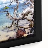 Close-up of a black framed canvas depicting Oahu, Hawaii, with vibrant, textured colors, ideal for living room decor.