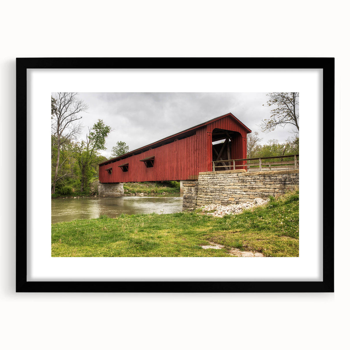 Extra large abstract art print of a colorful Indiana scenery on a textured canvas, framed in black.