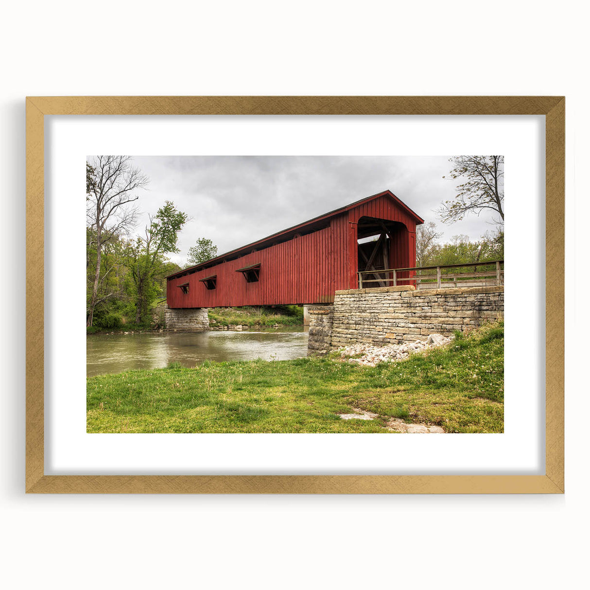 Extra large abstract art print of textured Indiana scenery in muted earth tones, framed in gold, ideal for living room decor.