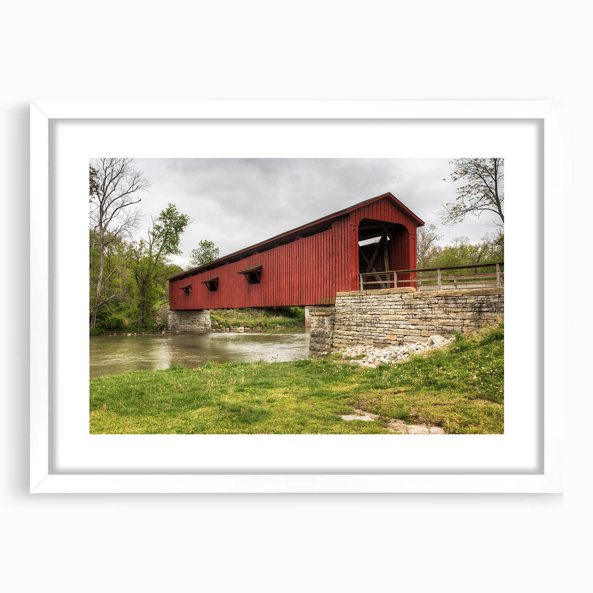 Abstract art print of Indiana scenery in muted earth tones, framed with a white mat, suitable for dining room decor.