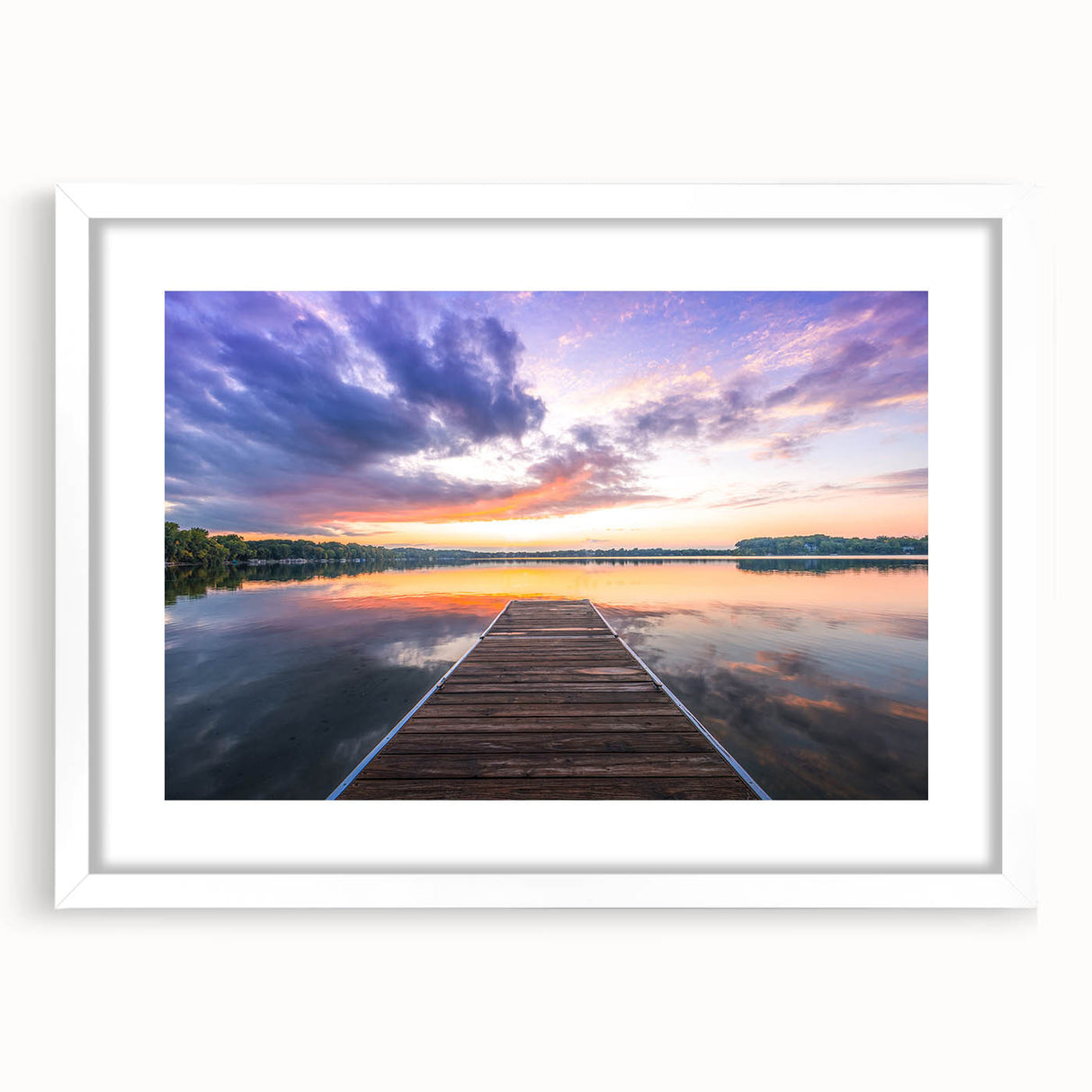 Abstract art print of Minnesota scenery in muted green and blue tones on a white framed canvas.