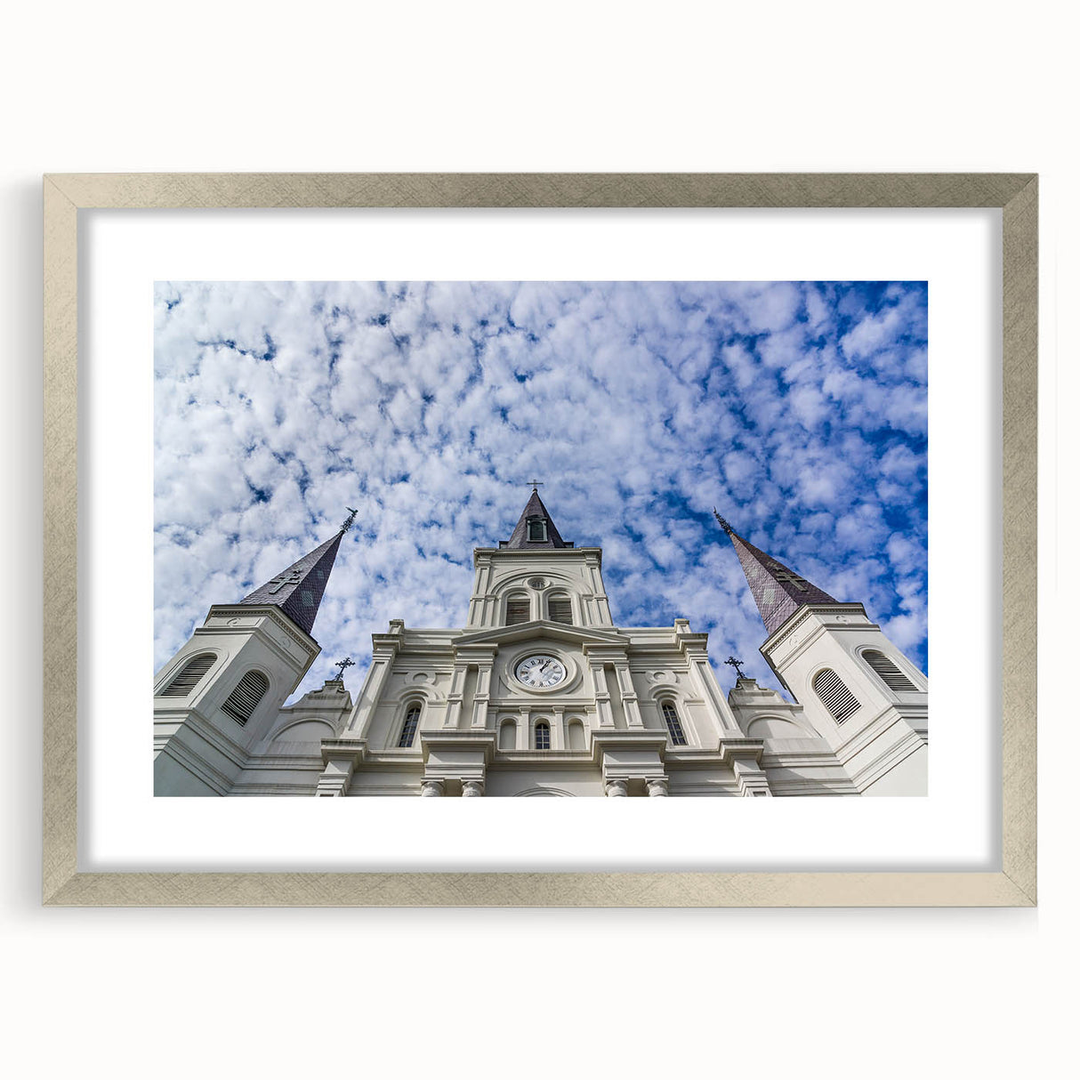 Textured abstract art print of St. Louis skyline in muted gray tones on a silver-framed canvas, suitable for bedroom decor.
