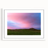 Abstract art print of Nebraska scenery in muted earth tones, framed with a white mat, ideal for dining room decor.