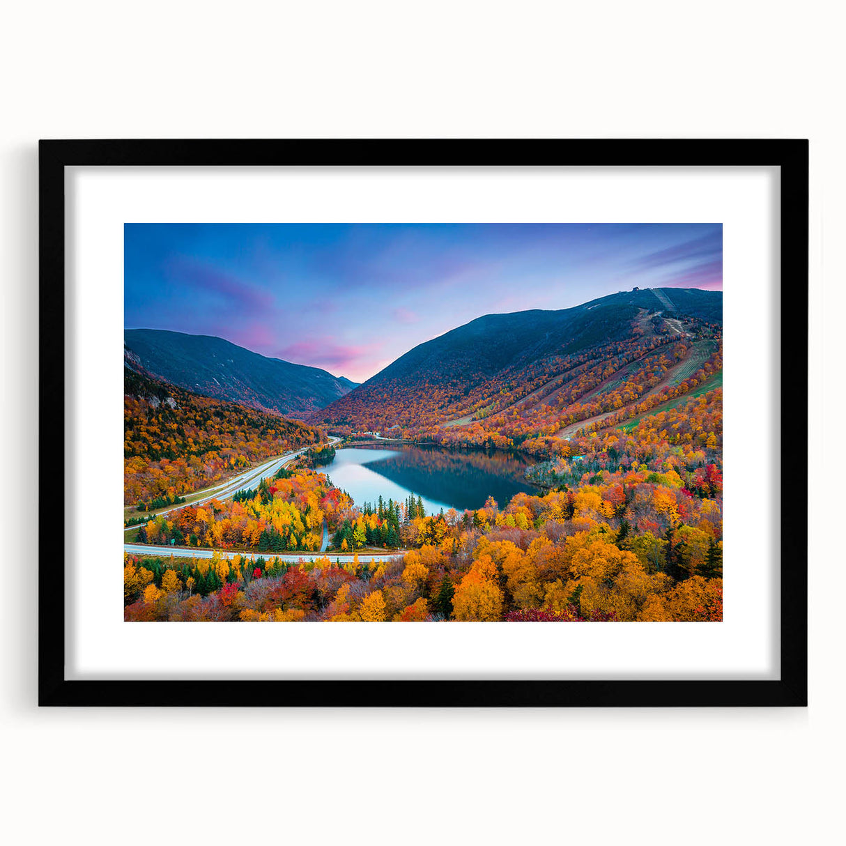 Extra large abstract art print of a textured, colorful New Hampshire scenery in a black frame, ideal for living room decor.