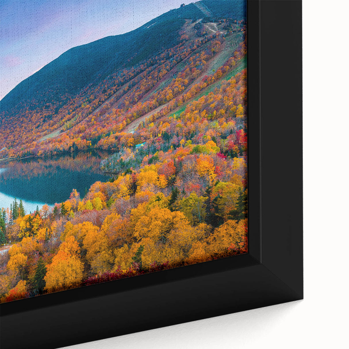 Close-up of a black framed canvas depicting a textured, colorful New Hampshire scenery, ideal for living room decor.