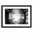 Extra large abstract art print of Charlotte skyline in colorful, textured style on a black framed canvas.