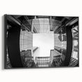Black and white framed canvas of Charlotte skyline with vintage poster style, ideal for bedroom wall art.
