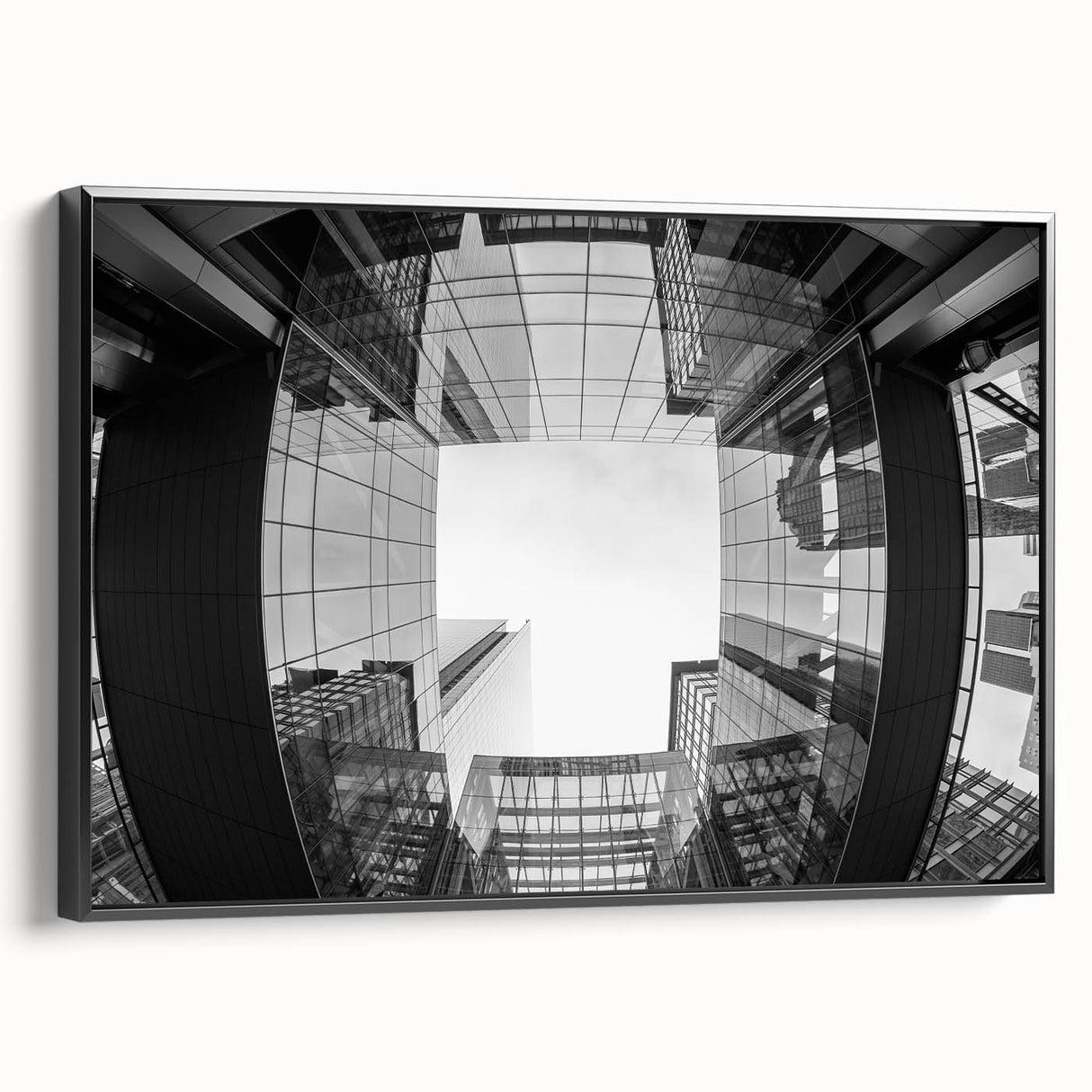 Black and white framed canvas of Charlotte skyline with vintage poster style, ideal for bedroom wall art.