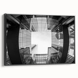 Black and white framed canvas of Charlotte skyline with vintage poster style, ideal for bedroom wall art.