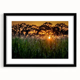 Extra large abstract art print of Raleigh, featuring textured, colorful art in vibrant hues, framed with a black mat.