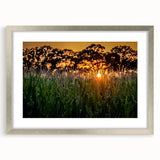 Textured abstract art print of Raleigh skyline in muted blue tones on a framed silver mat, ideal for bedroom art.