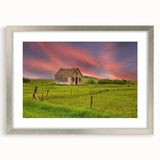 Textured abstract art print of North Dakota scenery in muted earth tones, framed in silver, suitable for bedroom decor.