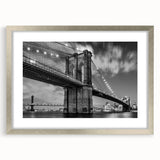 Textured art print of Brooklyn Bridge in muted gray tones on framed silver mat, suitable for bedroom art.