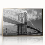 Acrylic print of the Brooklyn Bridge in grayscale, framed in gold, ideal for modern art wall decor.