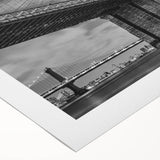 Art Deco poster of the Brooklyn Bridge in monochrome tones on rolled canvas, suitable for dining room decor.