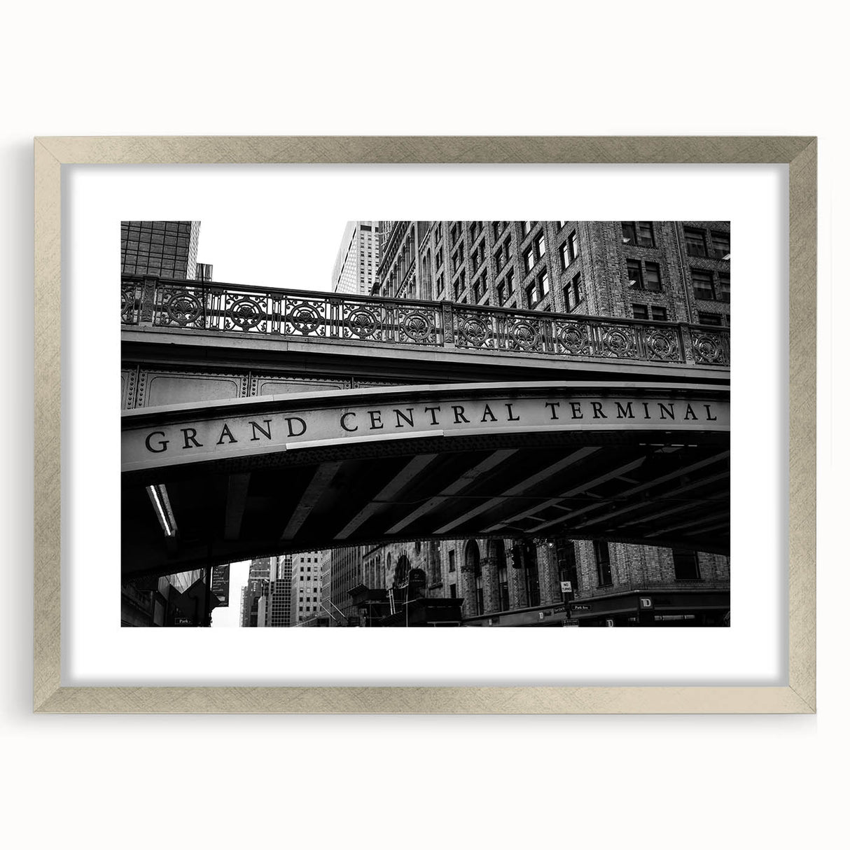 Textured abstract art print of NYC's Grand Central in muted gray tones, framed in silver, ideal for bedroom art.
