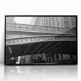 Framed acrylic print of a large abstract depiction of NYC's Grand Central, in black and gray tones.