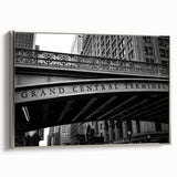 Framed canvas of a vintage-style NYC Grand Central scene in black with colorful accents, ideal for office decor.