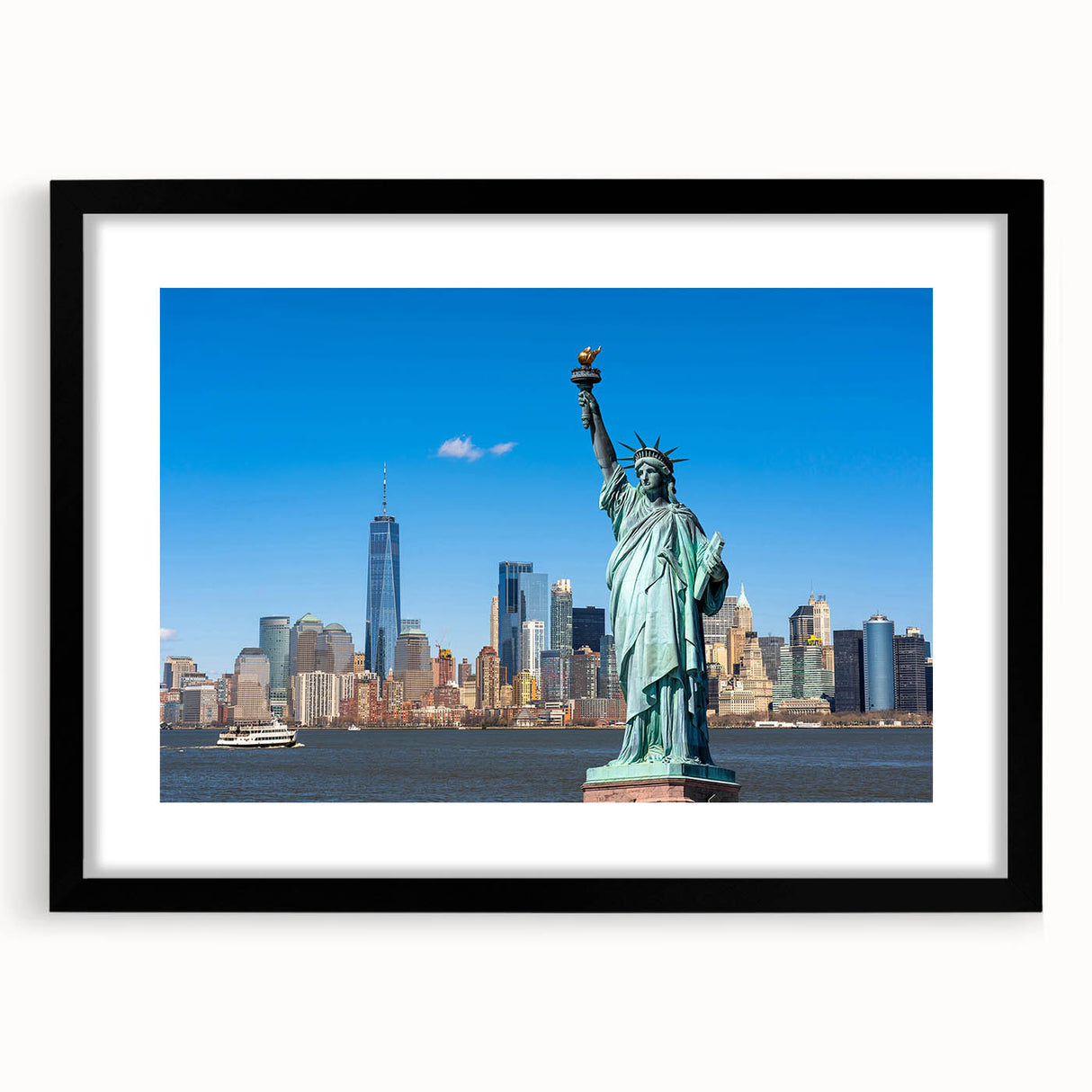 Abstract art print featuring a colorful rendition of the Statue of Liberty, set in a black frame with mat.