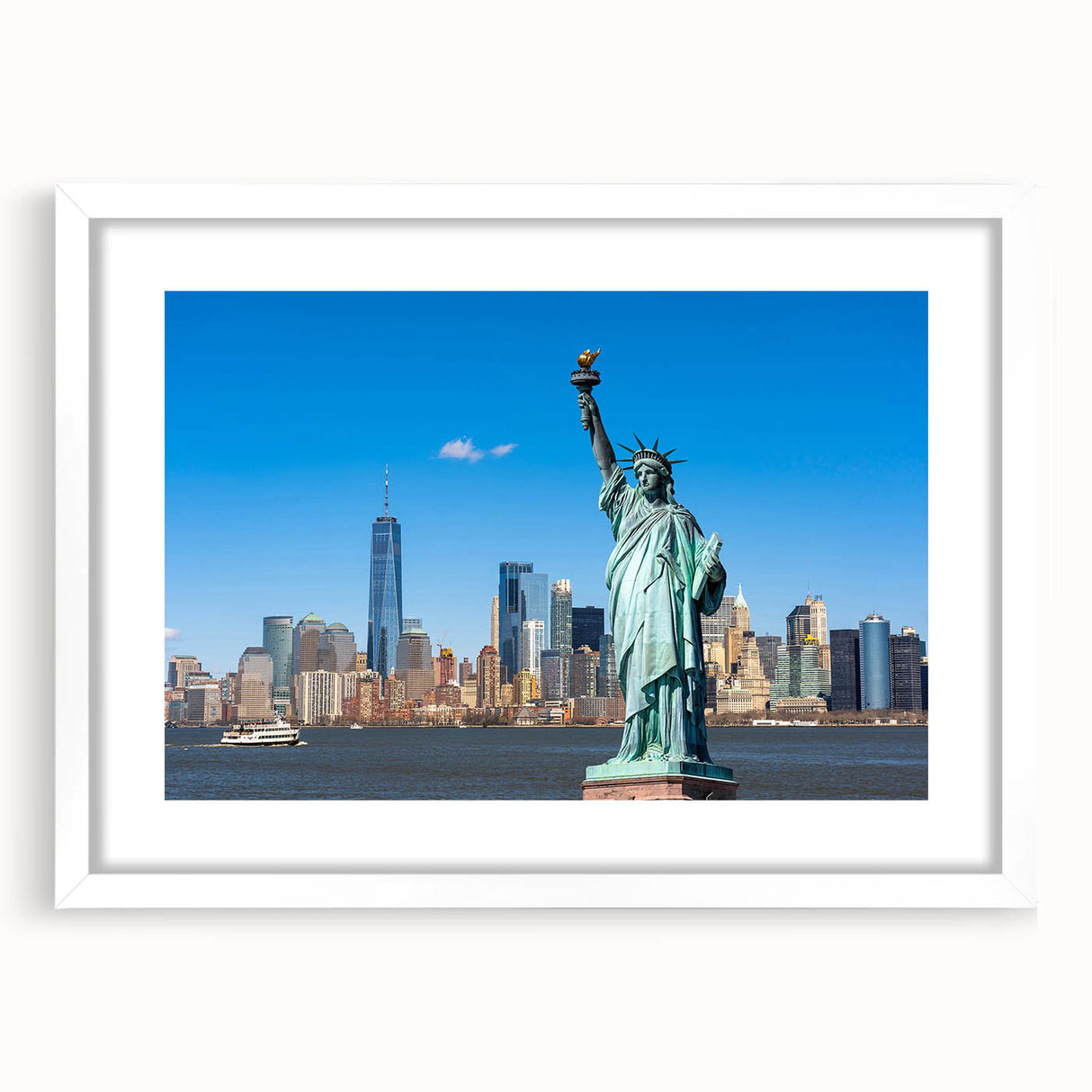 Abstract art print of the Statue of Liberty in muted blue and green tones on a white framed poster.