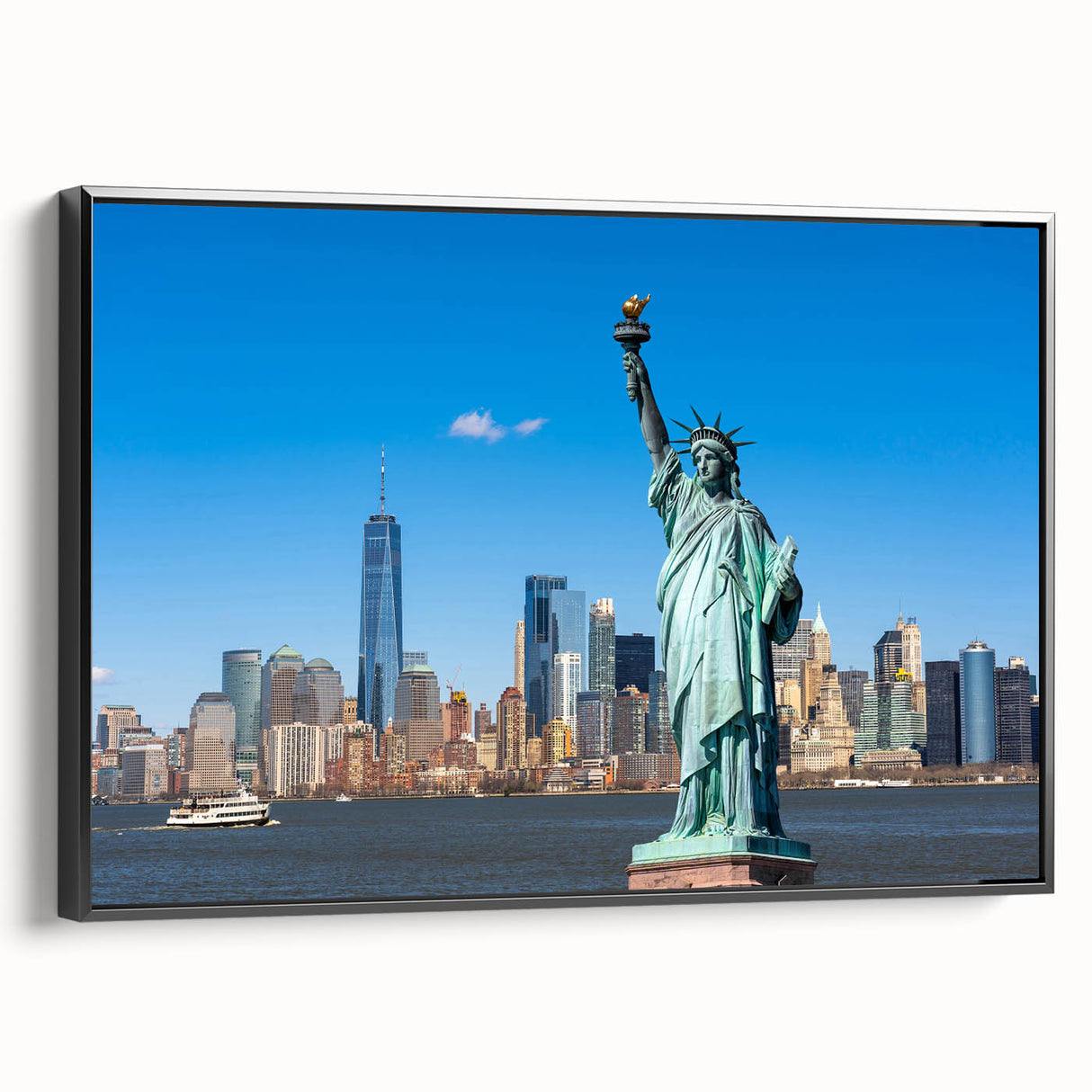 Black and white wall art featuring the Statue of Liberty in a vintage poster style on framed canvas.