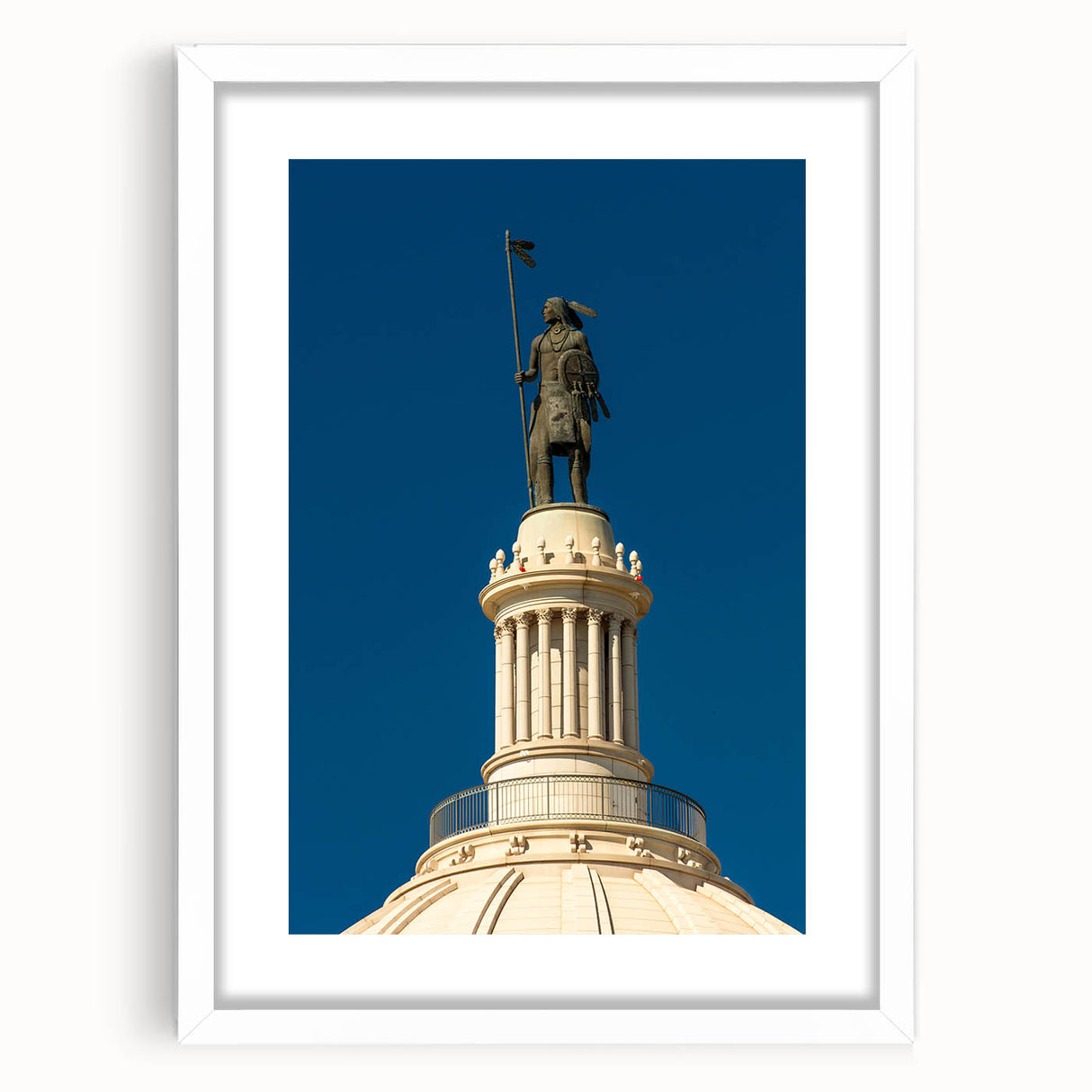 Abstract art print of Oklahoma scenery in muted earth tones on a white framed mat, suitable for dining room or bedroom decor.