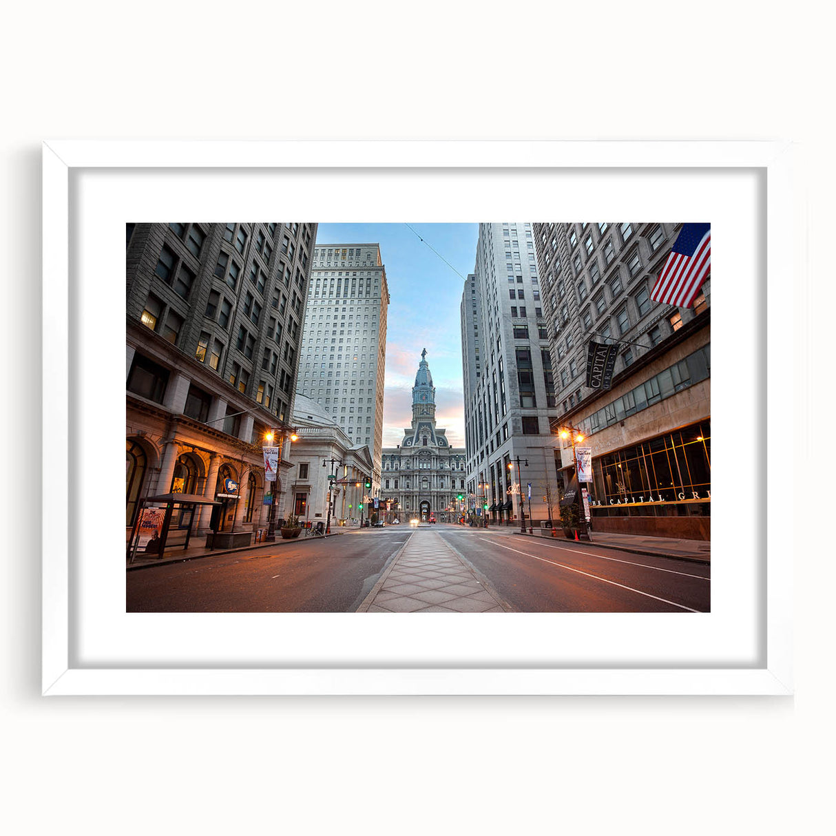 Abstract art print of Philadelphia skyline in muted gray and blue tones on a framed white mat, ideal for dining room decor.