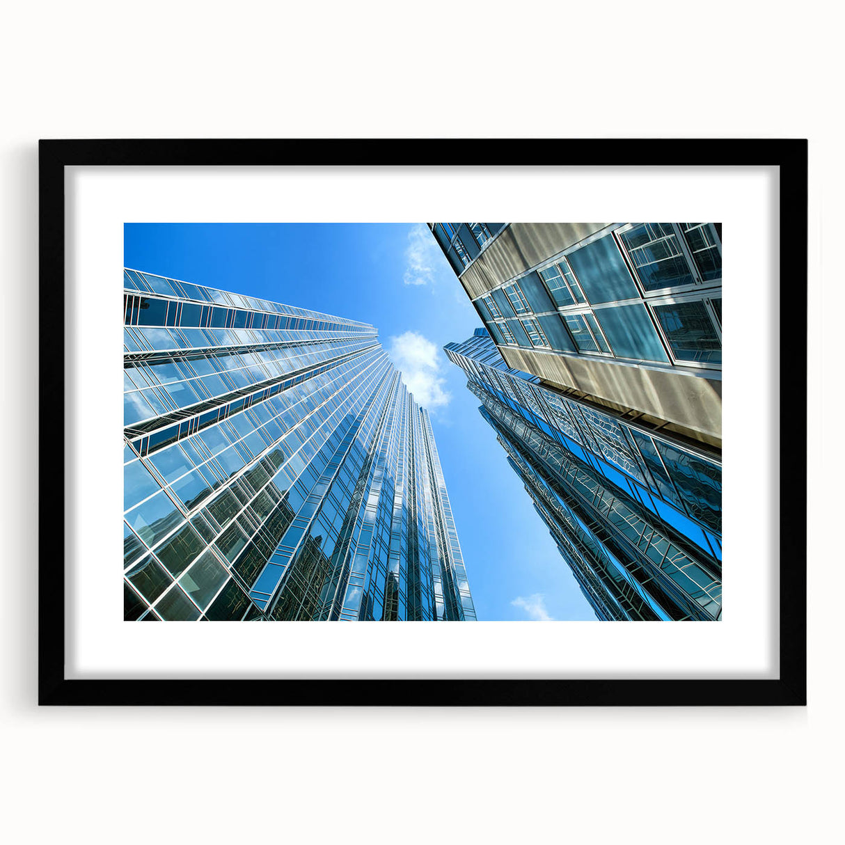 Colorful abstract art print of Pittsburgh skyline in vibrant hues on a textured, framed canvas, ideal for living room decor.