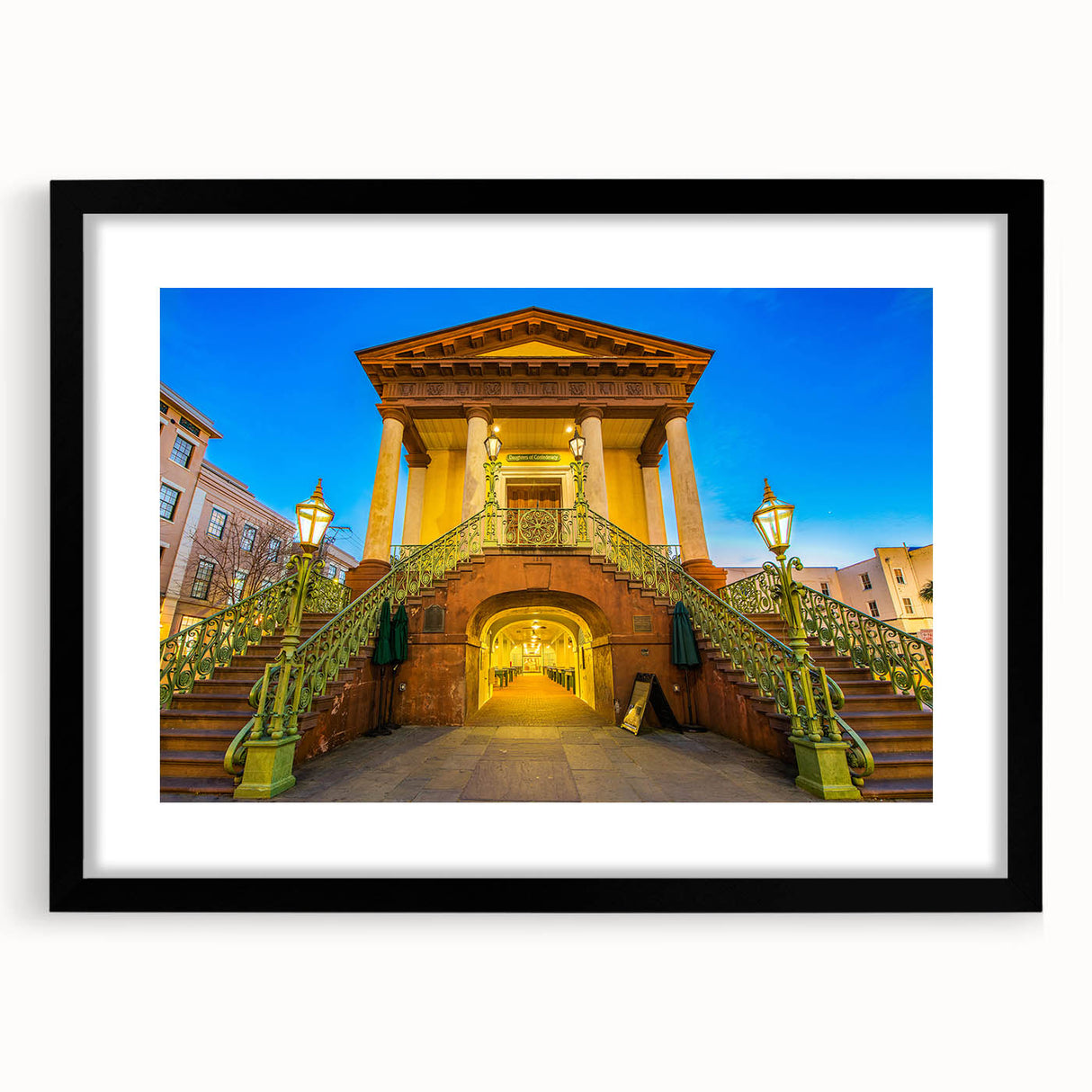 Extra large abstract art print of Charleston scenery in vibrant colors on a textured canvas, framed in black.