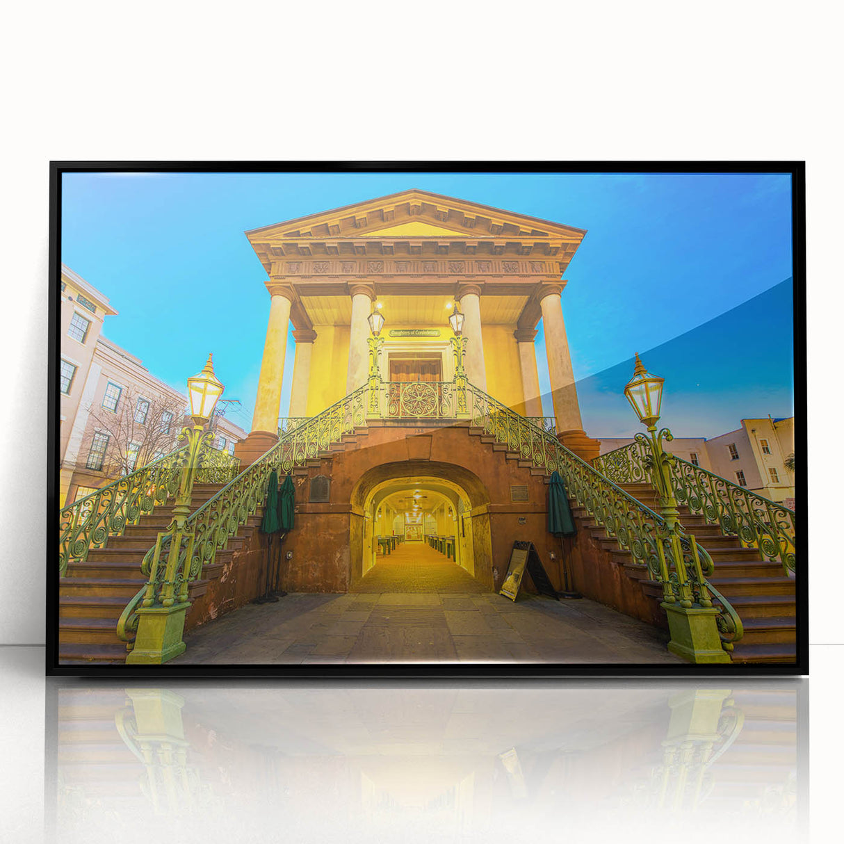 Large abstract wall art depicting a vibrant Charleston, South Carolina scene on a black framed acrylic.