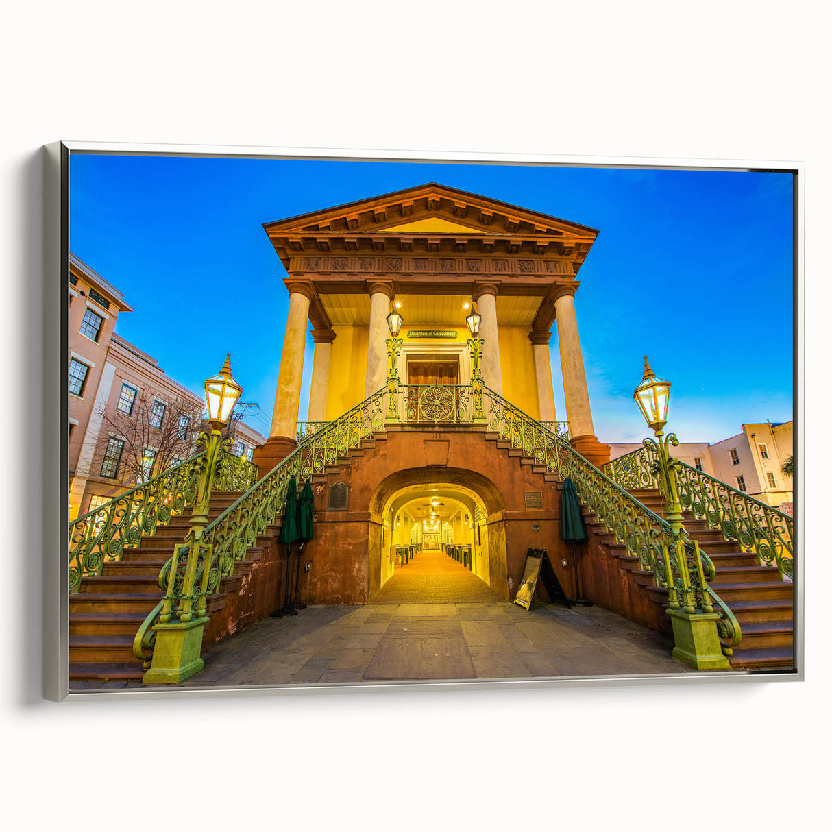 Framed canvas of a vintage-style Charleston landscape in black with colorful accents, ideal for living room decor.