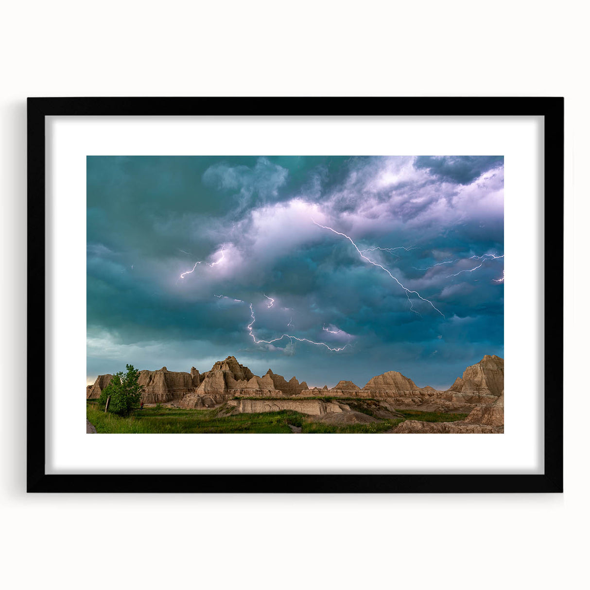 Abstract art print of South Dakota Badlands in vibrant colors on a large framed canvas, suitable for living room decor.