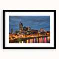 Extra large abstract art print of colorful, textured Nashville skyline on black framed canvas, ideal for living room decor.