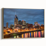 Framed canvas featuring a vintage-style landscape painting of Nashville, Tennessee in muted gold and black tones.