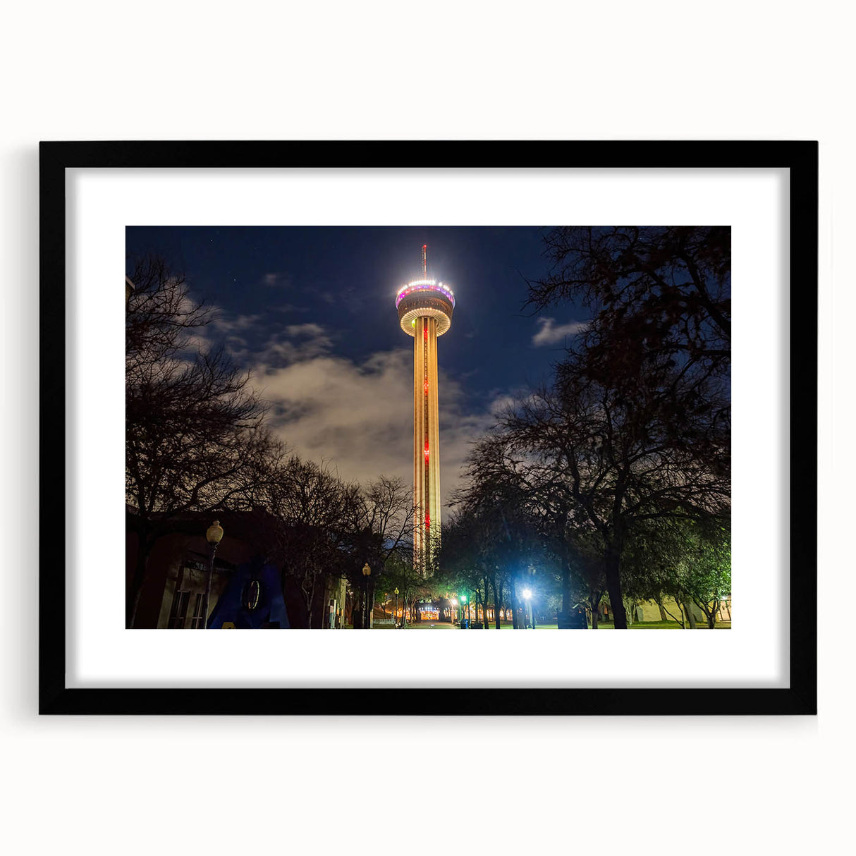 Extra large abstract art print of a colorful, textured San Antonio skyline on a black framed canvas.