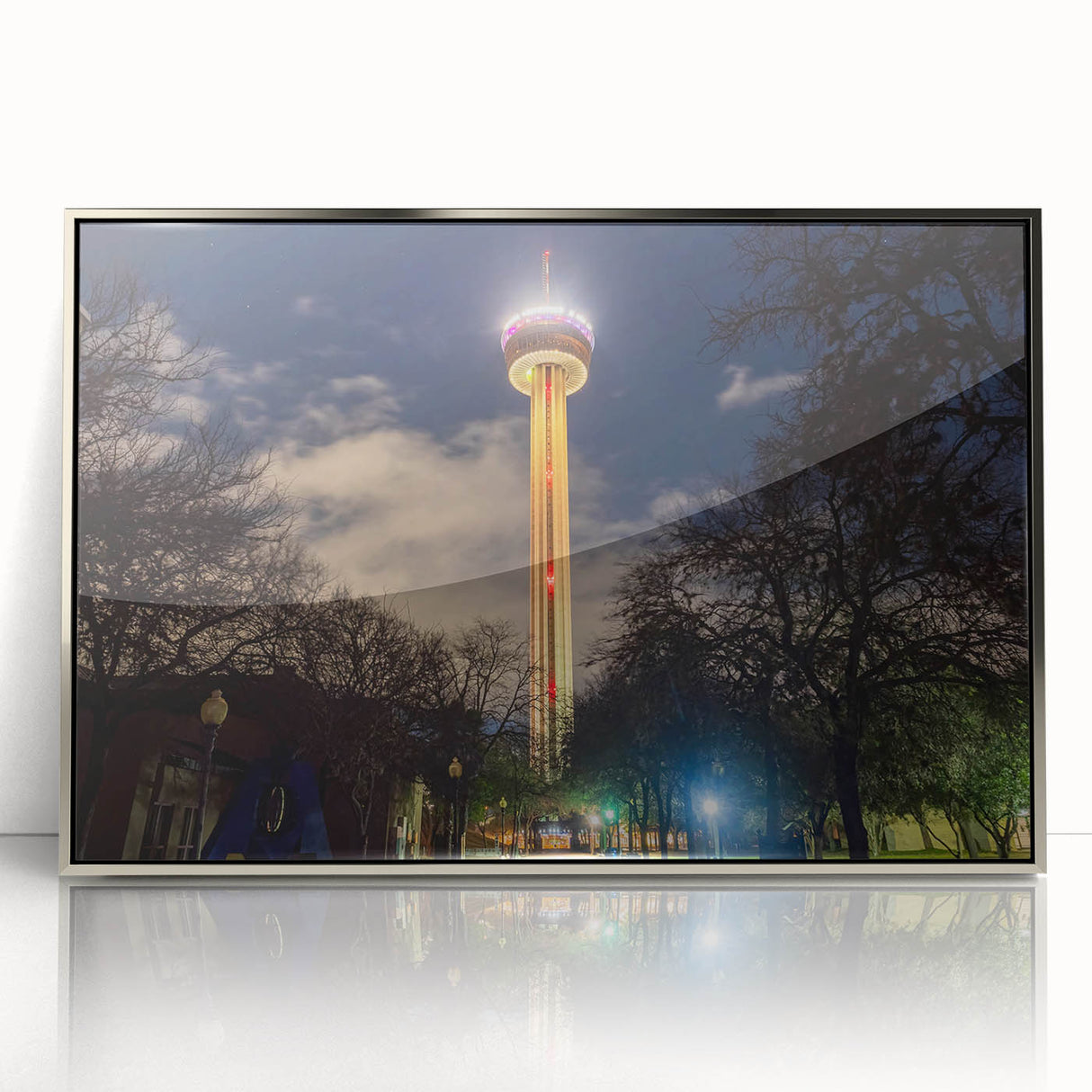 Mid-century modernist art featuring San Antonio skyline in muted gray tones, framed in silver acrylic.