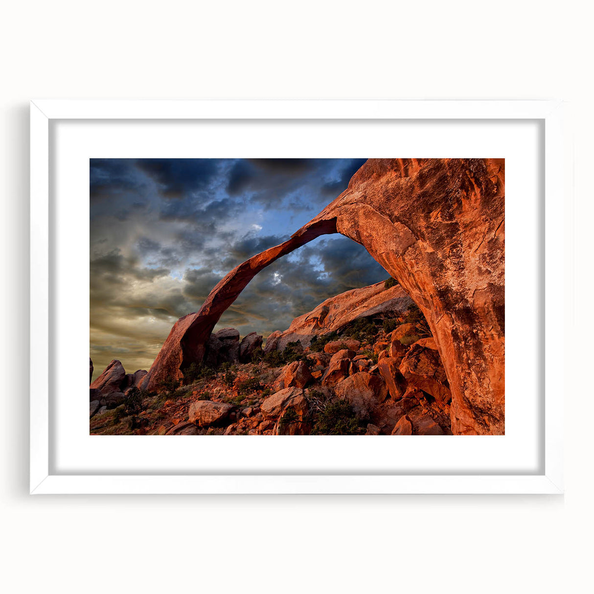 Abstract art print of Arches National Park in muted earth tones on a framed white mat, ideal for dining room decor.